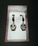 Tattooed skulls clip earrings