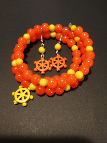 Orange memory wire bracelet and matching earrings.
