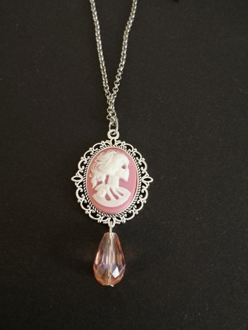 Pink skeletal woman necklace