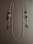Silver colored chain for glasses with pentagrams
