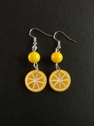 Orange earrings with yellow beads