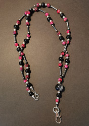 Key chain with black and fuchsia beads