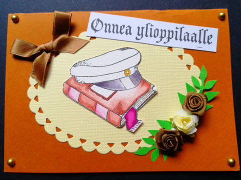 Kortti ylioppilaalle hattu ja kirja