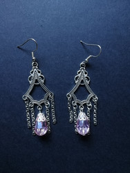 Hanging earrings with pink drop