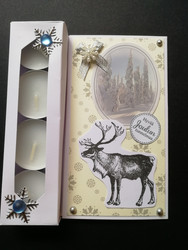 Candle card with a reindeer and winter scenery