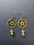 Steampunk gear earrings with green rainbow drops
