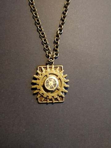 Steampunk necklace with clock parts