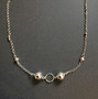 Silver colored bead necklace