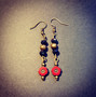 Red flower earrings with black beads