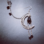Link earring crescent moon with black droplets
