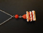 Piece of cake necklace with red bead