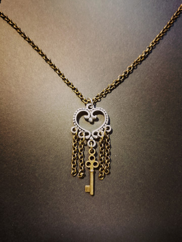Heart necklace with chains and key