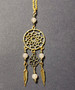 Gold colored dreamcatcher necklace