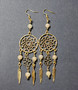 Gold colored dreamcatcher earrings with stones