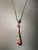 Medieval necklace with red pendant