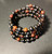Memory wire bracelet with black and brown wood beads