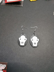 Black and white dog skull earrings