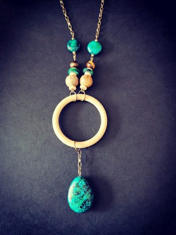 Green viking necklace with a large ring