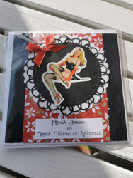 Joulukortti pin-up tyttö ja ruusut