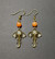 Elephant earrings with orange beads