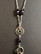 Pentagram key chain with black and violet
