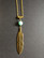 Feather necklace with stone bead