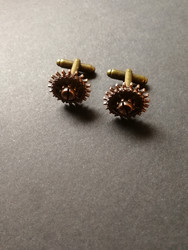 copper-colored screw gear cuff-links