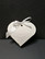White heart shaped gift bag