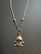 Small skull and cross bones necklace