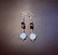 Blue flower earrings with black beads