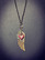 Wing and heart necklace