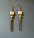Bronze colouring earrings with bronze colouring chain