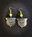 Sun and eye earrings with yellow stone beads