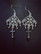 Hanging earrings with droplets and crosses