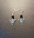 Eye earrings with black beads
