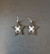 Black and white star spider earrings