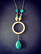Green viking necklace with a large ring