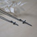 SIRO cross necklace in black by Sini Kolari