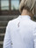 Long-sleeved, white collared shirt