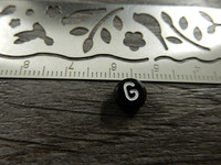 Kirjainhelmi G, 7mm, musta, 1kpl