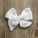 Rusettipinni, Harso, White