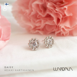 Lumoava Daisy -korvakorut kirkkaalla kivellä
