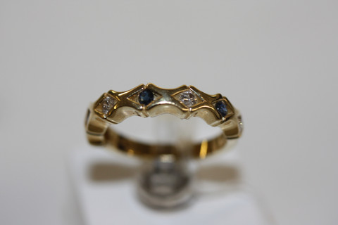 timantti ja sinisafiirisormus