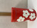 J33 Aarikkas Kukkaset tin can, red
