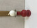 H106 Aarikkas Pikkiriikkinen candlestick in red