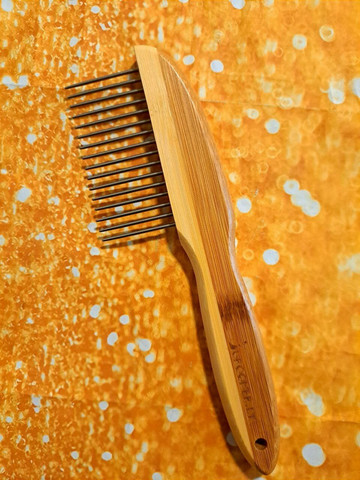 DETANGLER ''Long teeth'' comb with rotating teeth