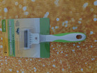 Andis kompakti pohjavillahara.  Andis Compact Deshedding tool
