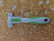 Andis kompakti pohjavillahara.  Andis Compact Deshedding tool