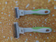Andis kompakti pohjavillahara.  Andis Compact Deshedding tool