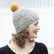 Beanie with yellow pom pom